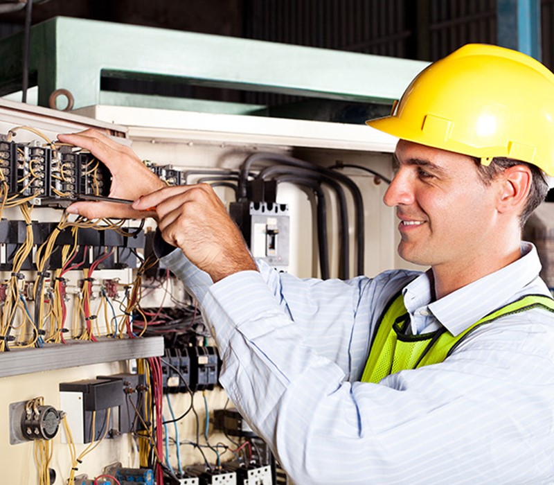 Electrician completing electrical wiring work - Electrical Bundagerg